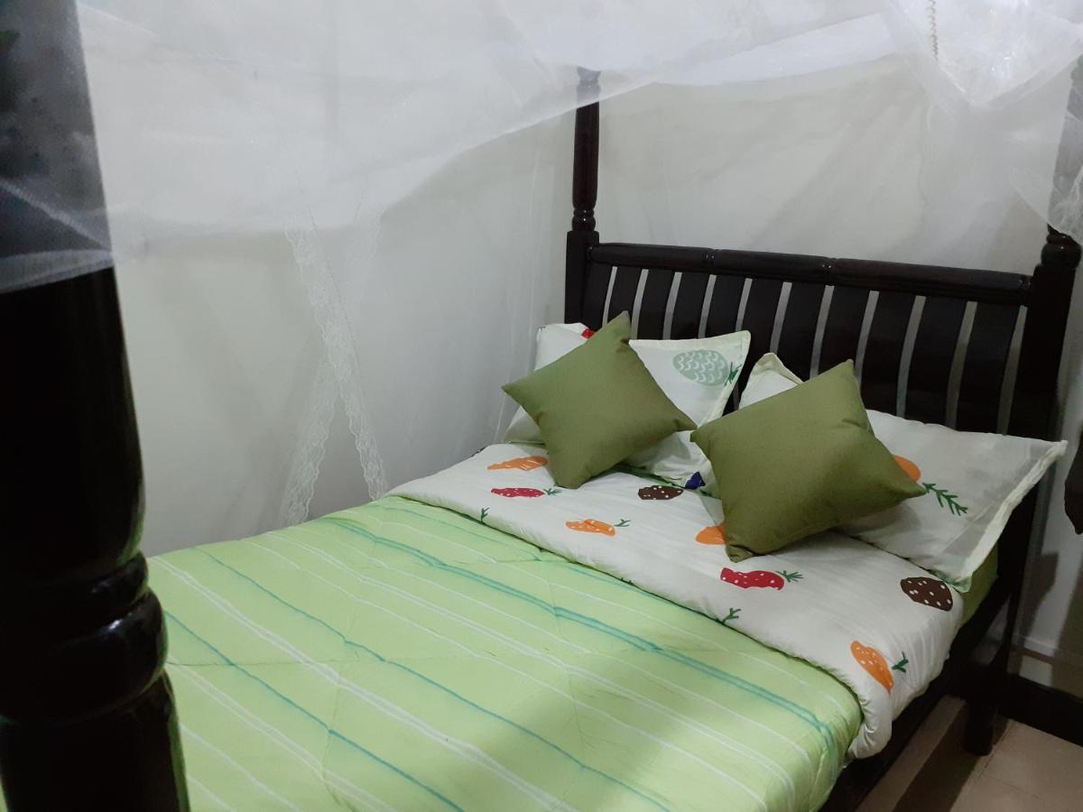 Okra House Hotel Entebbe Exterior photo